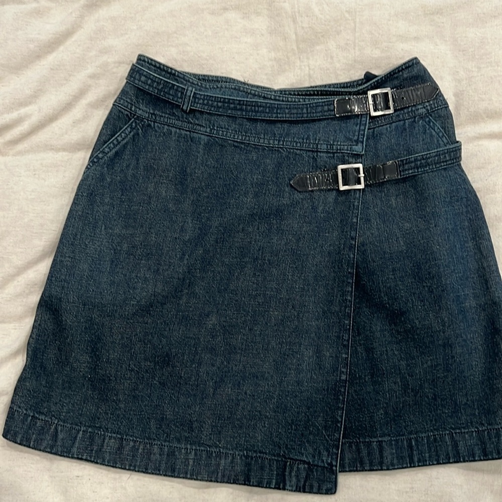 Chanel mini jean skirt with silver buckles. Size 36